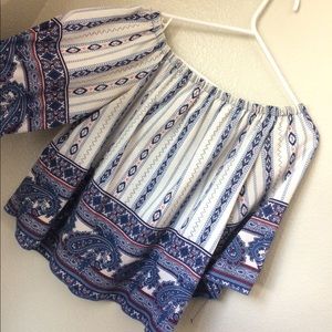 Top with floral/tribal design